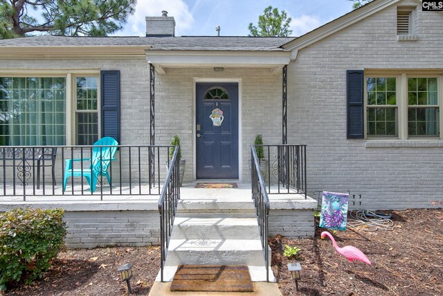 4524 Mosshill Rd, Columbia, SC 29206 - entrance to property with a chimney and brick siding