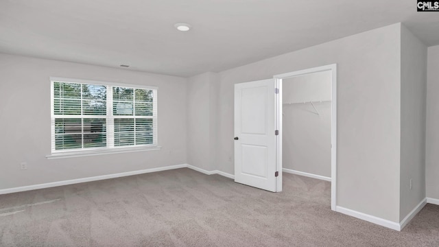 11A Beechnut St, Lugoff, SC 29078 - unfurnished bedroom featuring carpet floors, a walk in closet, and a closet