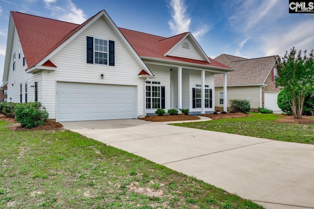 612 Bur Oak Ln, Columbia, SC 29229 - view of front of home with driveway, a garage, a front yard, covered porch, and roof with shingles
