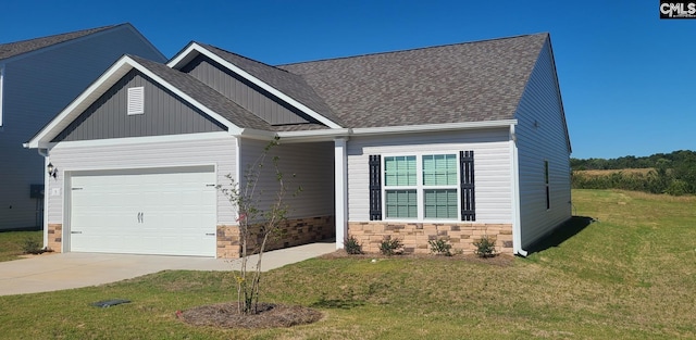 5 Graceful Doe Ct, Elgin, SC 29045 - craftsman inspired home with an attached garage, driveway, a front yard, roof with shingles, and stone siding