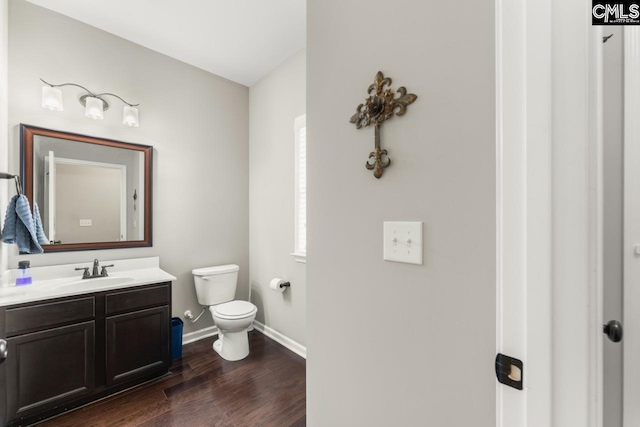 300 Brookland Way W, Columbia, SC 29169 - bathroom featuring toilet, vanity, wood finished floors, and baseboards