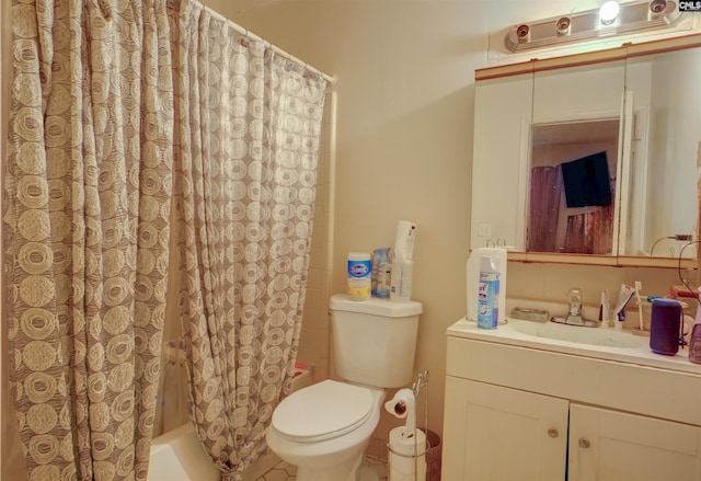 1211 Metze Rd Unit G2, Columbia, SC 29210 - bathroom featuring vanity, toilet, and shower / bath combo with shower curtain