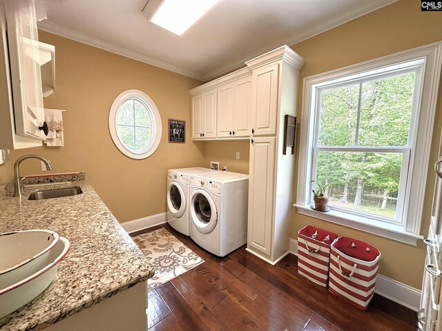 166 Sawney Creek Cir, Ridgeway, SC 29130 - laundry room with separate washer and dryer, cabinet space, crown molding, dark wood-style flooring, and baseboards