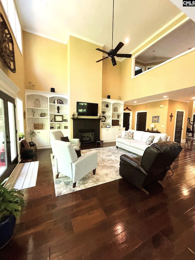 166 Sawney Creek Cir, Ridgeway, SC 29130 - living area with a towering ceiling, hardwood / wood-style flooring, ceiling fan, ornamental molding, and a fireplace