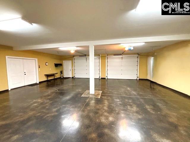 166 Sawney Creek Cir, Ridgeway, SC 29130 - garage featuring baseboards