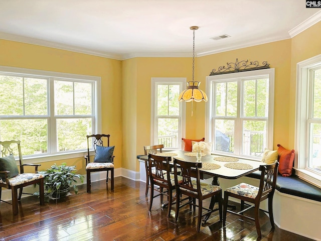 166 Sawney Creek Cir, Ridgeway, SC 29130 - dining space featuring dark wood-type flooring, crown molding, and baseboards