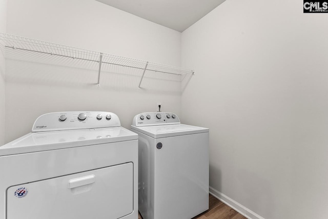 337 Gum Swamp Trl, West Columbia, SC 29169 - laundry room with washer and dryer, wood finished floors, and baseboards