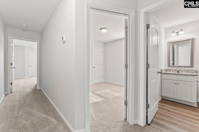 337 Gum Swamp Trl, West Columbia, SC 29169 - corridor featuring light carpet and baseboards