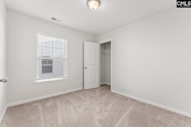 339 Gum Swamp Trl, West Columbia, SC 29169 - unfurnished bedroom with carpet, baseboards, and a closet