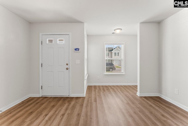 339 Gum Swamp Trl, West Columbia, SC 29169 - entryway with light wood-type flooring and baseboards