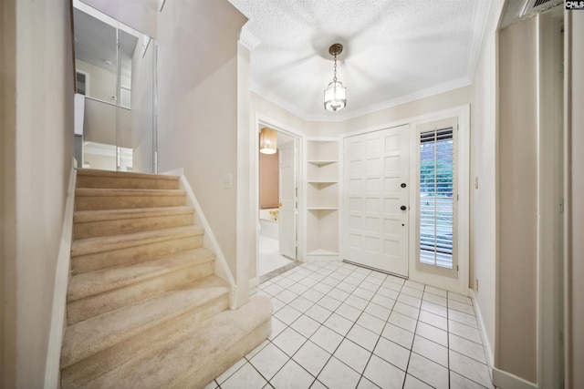 137 Shannondale Ct, Columbia, SC 29209 - entryway featuring crown molding, stairway, baseboards, light tile patterned floors, and a textured ceiling