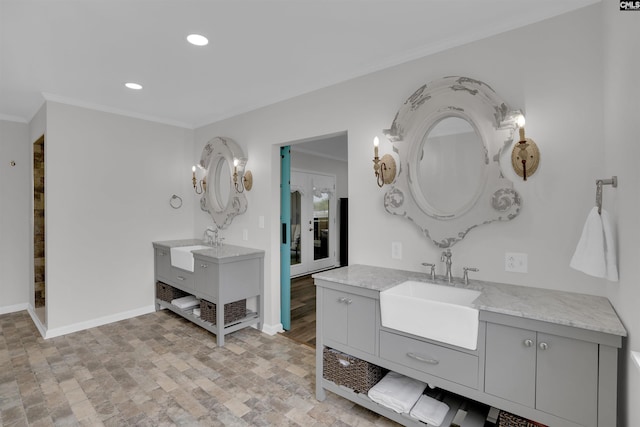 1620 Deep Cove Ln, Gilbert, SC 29054 - bathroom with ornamental molding, baseboards, two vanities, recessed lighting, and stone finish flooring