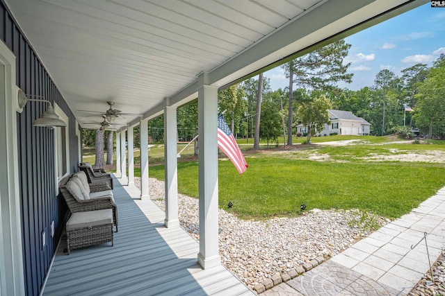 1620 Deep Cove Ln, Gilbert, SC 29054 - porch featuring ceiling fan, a yard, and view of scattered trees