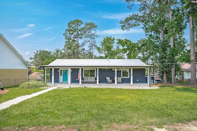 1620 Deep Cove Ln, Gilbert, SC 29054 - back of house featuring a lawn, metal roof, and a porch