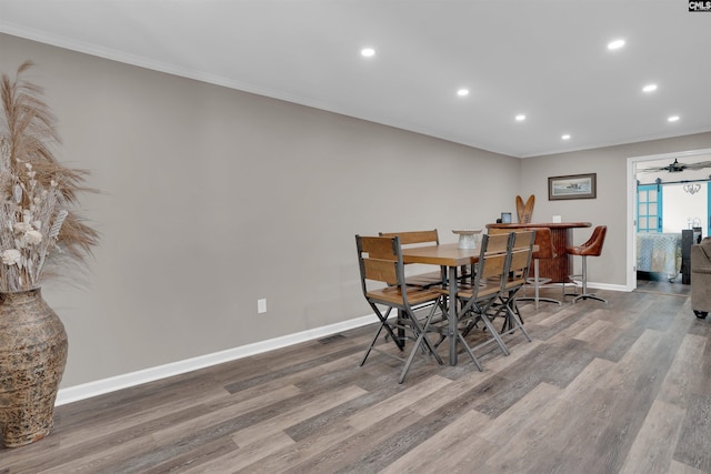 1620 Deep Cove Ln, Gilbert, SC 29054 - dining room featuring ornamental molding, wood finished floors, baseboards, and recessed lighting