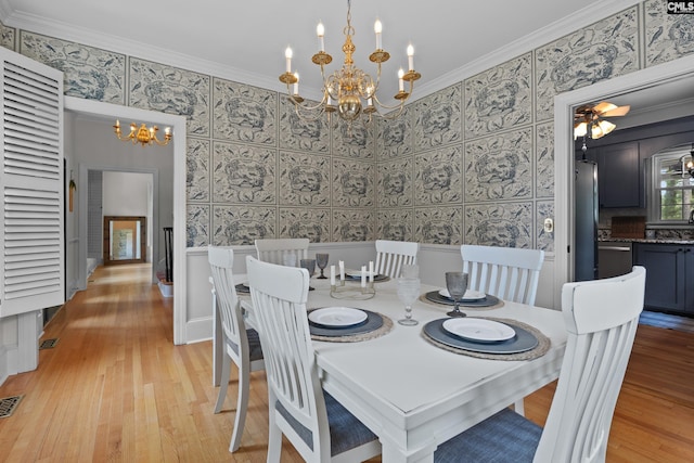 22 Mallet Hill Ct, Columbia, SC 29223 - dining area with a chandelier, crown molding, light wood-style floors, and wallpapered walls