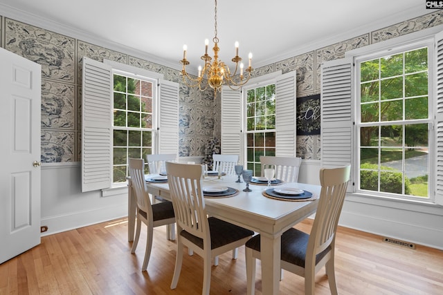 22 Mallet Hill Ct, Columbia, SC 29223 - dining space featuring wallpapered walls, a chandelier, light wood-style floors, baseboards, and crown molding