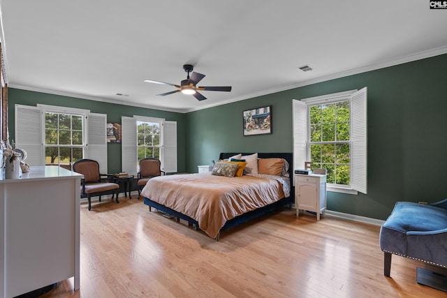 22 Mallet Hill Ct, Columbia, SC 29223 - bedroom with crown molding, light wood-type flooring, baseboards, and a ceiling fan