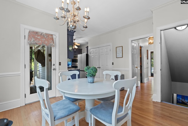 22 Mallet Hill Ct, Columbia, SC 29223 - dining room featuring a chandelier, crown molding, and light wood finished floors