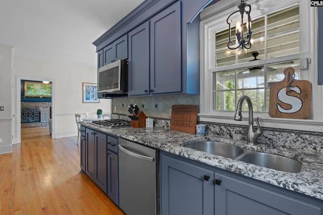 22 Mallet Hill Ct, Columbia, SC 29223 - kitchen with a sink, appliances with stainless steel finishes, tasteful backsplash, and light stone countertops