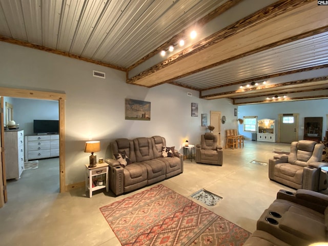 290 Gunter Pond Rd, Wagener, SC 29164 - living area featuring beam ceiling and concrete floors