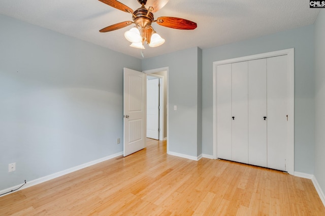 201 Mariners Row, Columbia, SC 29212 - unfurnished bedroom featuring wood finished floors, baseboards, a closet, and ceiling fan