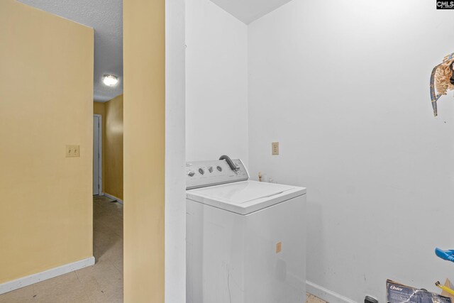 114 Quattlebaum Ave, Ridge Spring, SC 29129 - laundry area with washer / dryer and baseboards