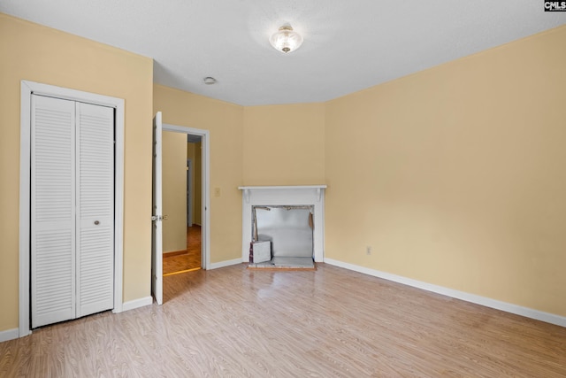 114 Quattlebaum Ave, Ridge Spring, SC 29129 - unfurnished living room with wood finished floors and baseboards