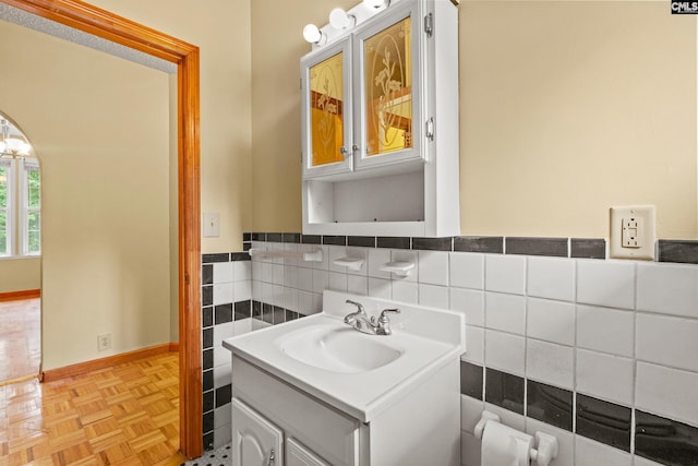 114 Quattlebaum Ave, Ridge Spring, SC 29129 - bathroom with vanity, tile walls, and baseboards