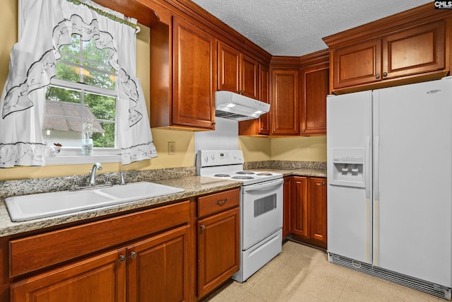114 Quattlebaum Ave, Ridge Spring, SC 29129 - kitchen with white appliances, extractor fan, a sink, a textured ceiling, and light flooring
