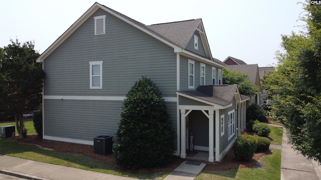 1929 Bluff Rd Unit 140, Columbia, SC 29201 - view of side of property featuring central air condition unit and roof with shingles