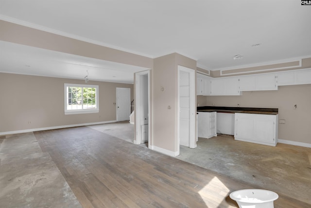 4712 Leaf Crest Ct, Columbia, SC 29210 - unfurnished living room featuring baseboards and ornamental molding