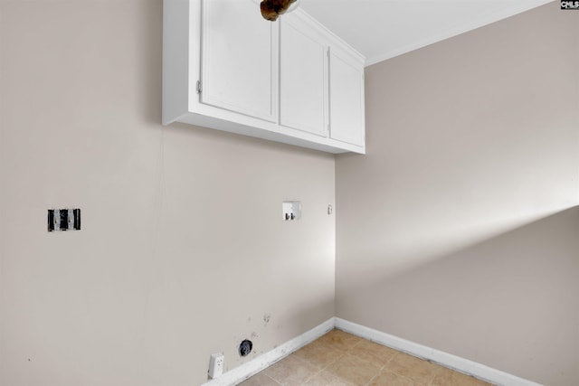 4712 Leaf Crest Ct, Columbia, SC 29210 - laundry area featuring hookup for a gas dryer, cabinet space, baseboards, washer hookup, and electric dryer hookup