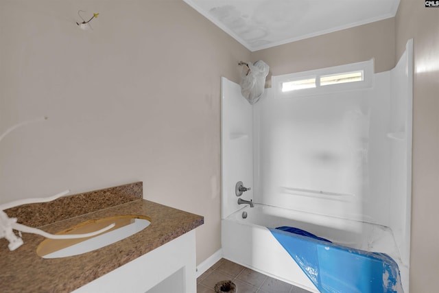 4712 Leaf Crest Ct, Columbia, SC 29210 - bathroom featuring ornamental molding, tile patterned floors, bathtub / shower combination, vanity, and baseboards