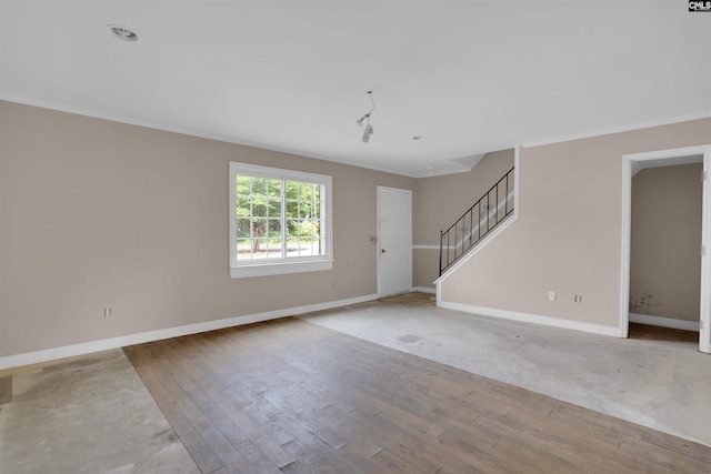 4712 Leaf Crest Ct, Columbia, SC 29210 - unfurnished living room featuring crown molding, stairs, baseboards, and wood finished floors