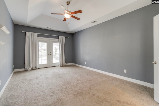 571 Maple Valley Loop, Blythewood, SC 29016 - carpeted spare room featuring a tray ceiling, french doors, ceiling fan, and baseboards