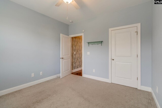 571 Maple Valley Loop, Blythewood, SC 29016 - unfurnished bedroom with carpet flooring, baseboards, and ceiling fan