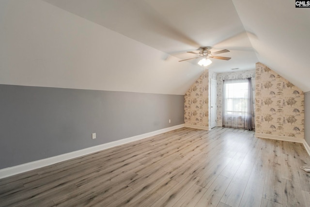 571 Maple Valley Loop, Blythewood, SC 29016 - bonus room with ceiling fan, wood finished floors, baseboards, lofted ceiling, and wallpapered walls