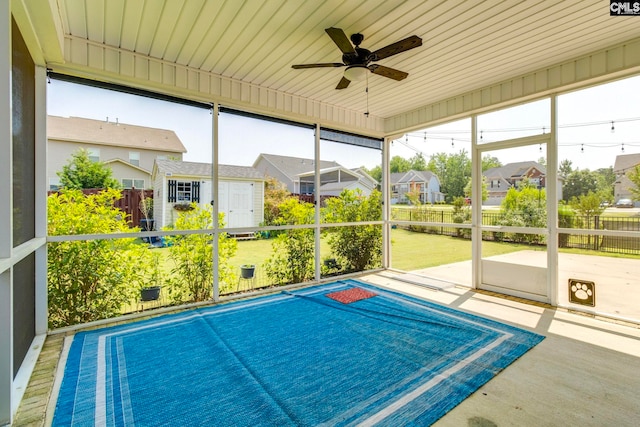 571 Maple Valley Loop, Blythewood, SC 29016 - unfurnished sunroom featuring a ceiling fan and a residential view