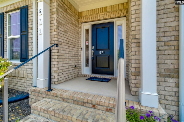 571 Maple Valley Loop, Blythewood, SC 29016 - view of exterior entry featuring brick siding and covered porch