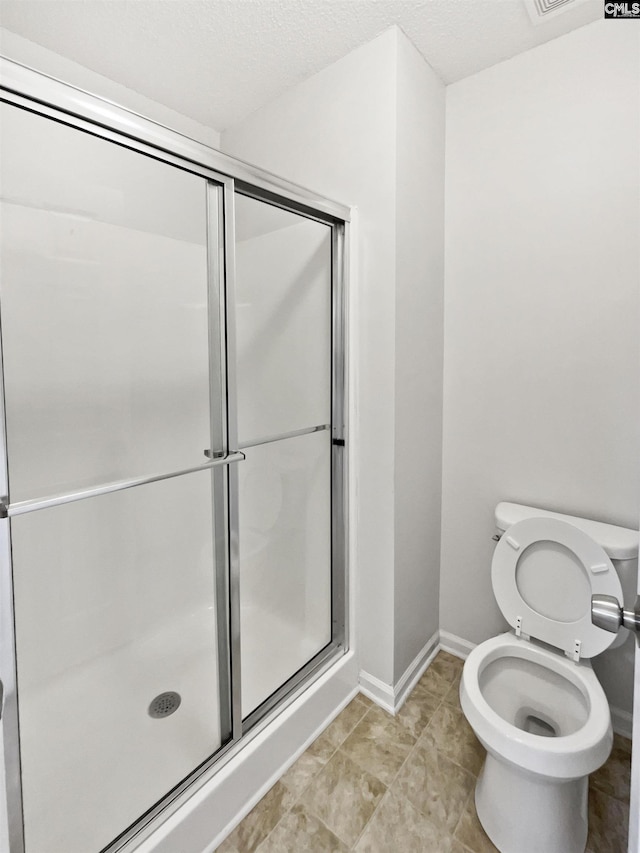 186 Fallstaff Rd, Columbia, SC 29229 - bathroom with a stall shower, toilet, and baseboards