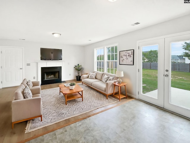 186 Fallstaff Rd, Columbia, SC 29229 - living room featuring french doors, a fireplace with flush hearth, and baseboards