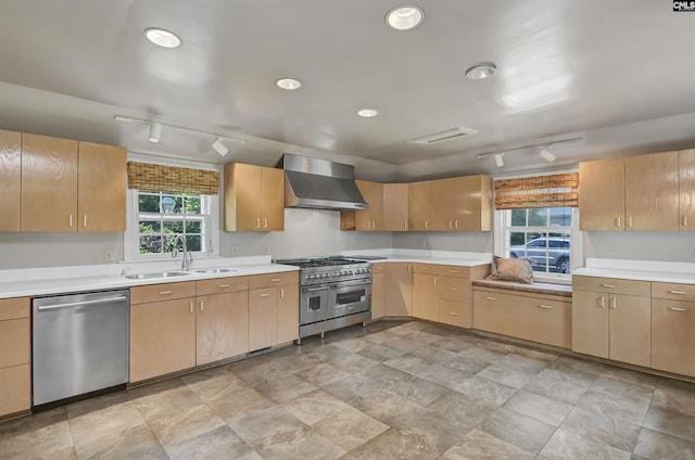 723 Hampton Hill Rd, Columbia, SC 29209 - kitchen with appliances with stainless steel finishes, wall chimney range hood, rail lighting, a sink, and light countertops