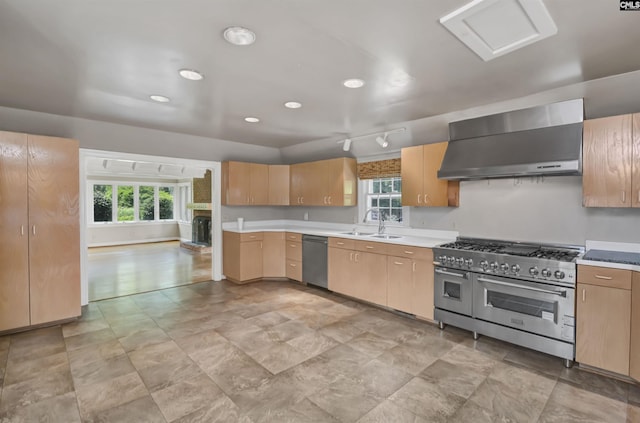723 Hampton Hill Rd, Columbia, SC 29209 - kitchen with wall chimney range hood, stainless steel appliances, plenty of natural light, a sink, and recessed lighting