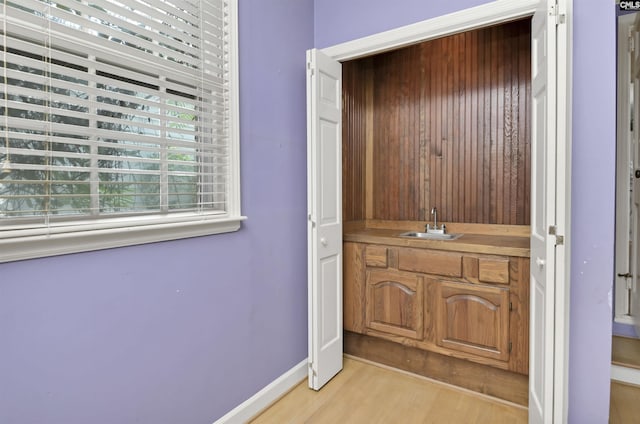 723 Hampton Hill Rd, Columbia, SC 29209 - interior space with a sink, light wood-style flooring, and baseboards