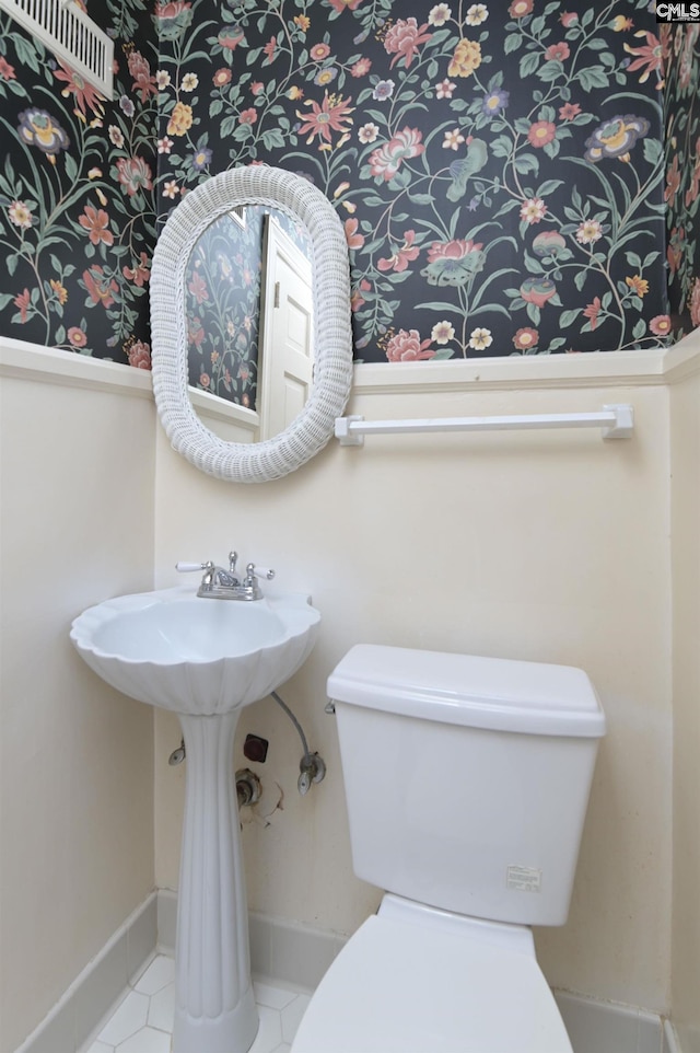 723 Hampton Hill Rd, Columbia, SC 29209 - half bathroom featuring tile patterned flooring, baseboards, and toilet