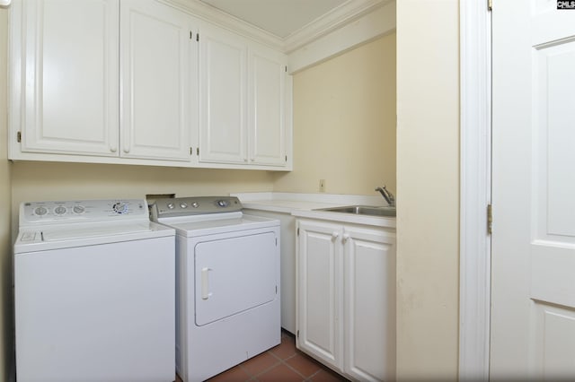 723 Hampton Hill Rd, Columbia, SC 29209 - laundry room featuring cabinet space, washing machine and clothes dryer, dark tile patterned floors, and crown molding