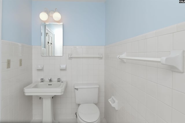 723 Hampton Hill Rd, Columbia, SC 29209 - bathroom featuring toilet, tile walls, wainscoting, and a sink