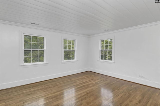 723 Hampton Hill Rd, Columbia, SC 29209 - empty room featuring plenty of natural light, ornamental molding, baseboards, wood finished floors, and wood ceiling