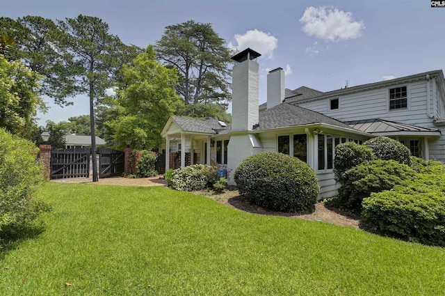 723 Hampton Hill Rd, Columbia, SC 29209 - back of house featuring a gate, a chimney, a standing seam roof, and a shingled roof